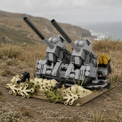 Twin flak guns brick build on coastal grassland; scene props not included.