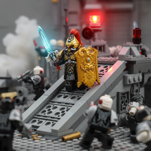 Black-armored imperial sentinel minifigure leading an assault down a brick-built sci-fi ramp
