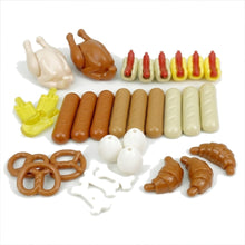 Mini mixed food accessories on a white background