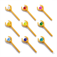 Gold magic staff accessories on a white background