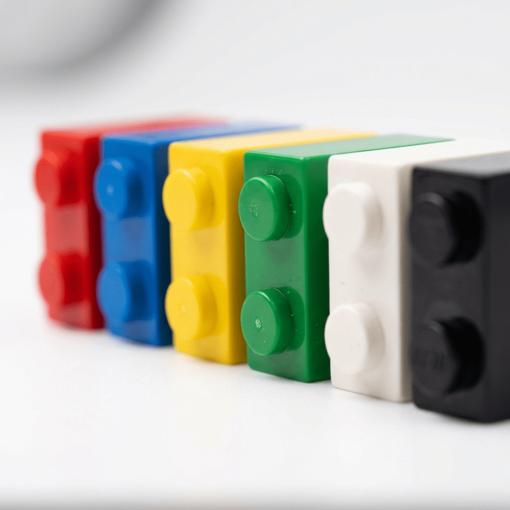 Building bricks in red, blue, yellow, green, white and black