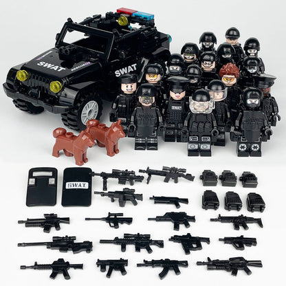 Matching high-resolution L-19 full set contents photo: SWAT Jeep, team, two brown dogs and accessories