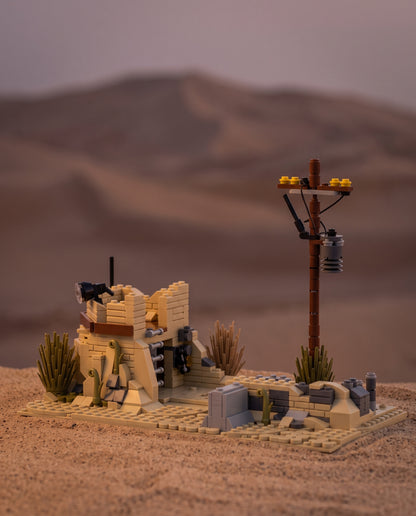 Desert Sandbag Post with Power Pole in an illustrative scene. Scenery and additional props not included.